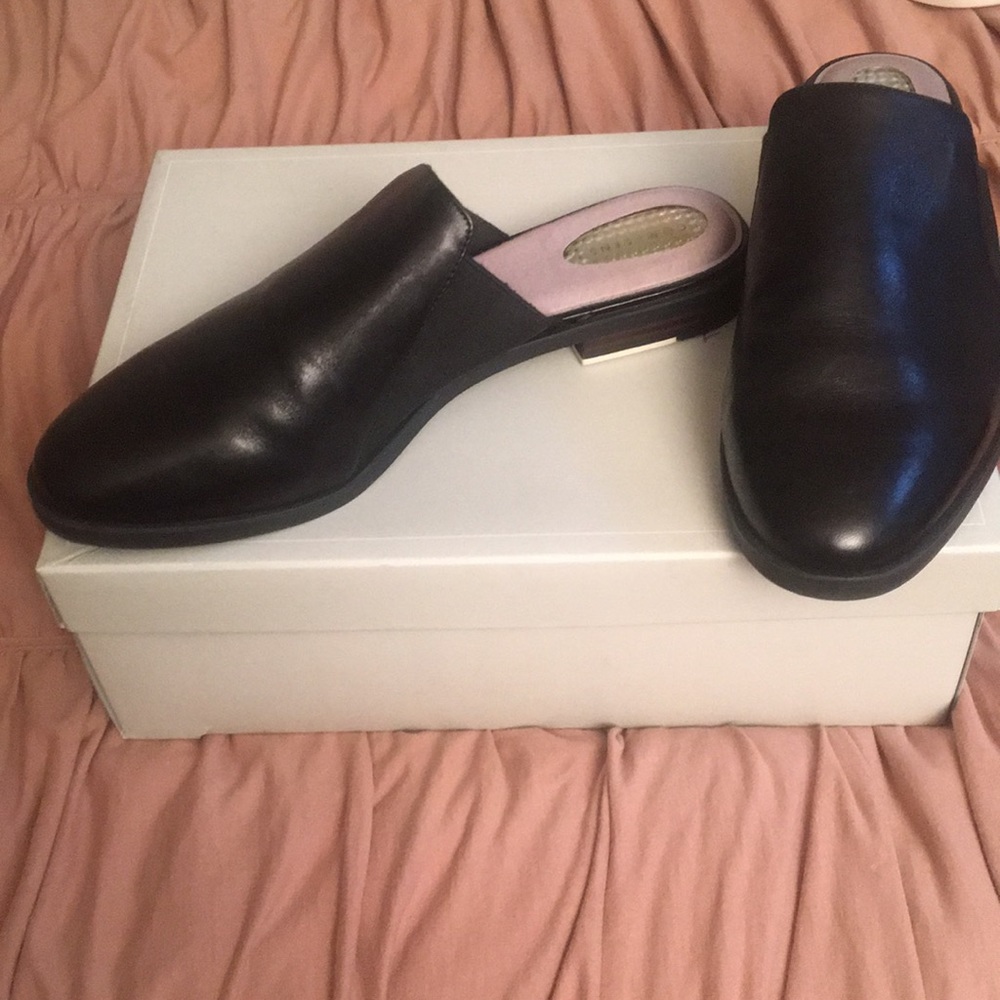 Black leather slides